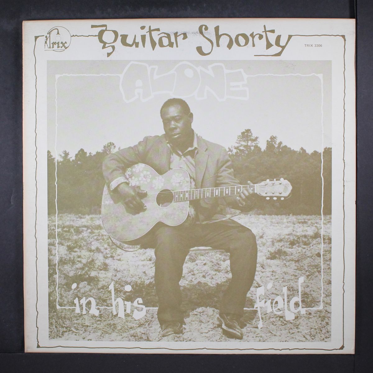 alone in his field by GUITAR SHORTY
