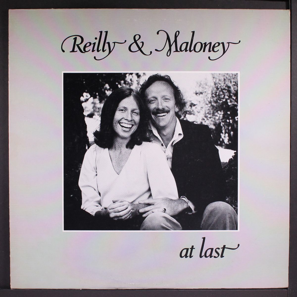 at last by REILLY & MALONEY