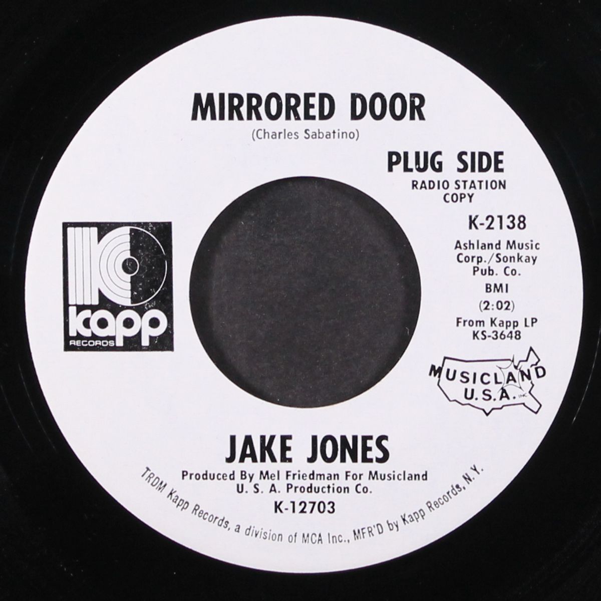 mirrored door / feather bed by JAKE JONES