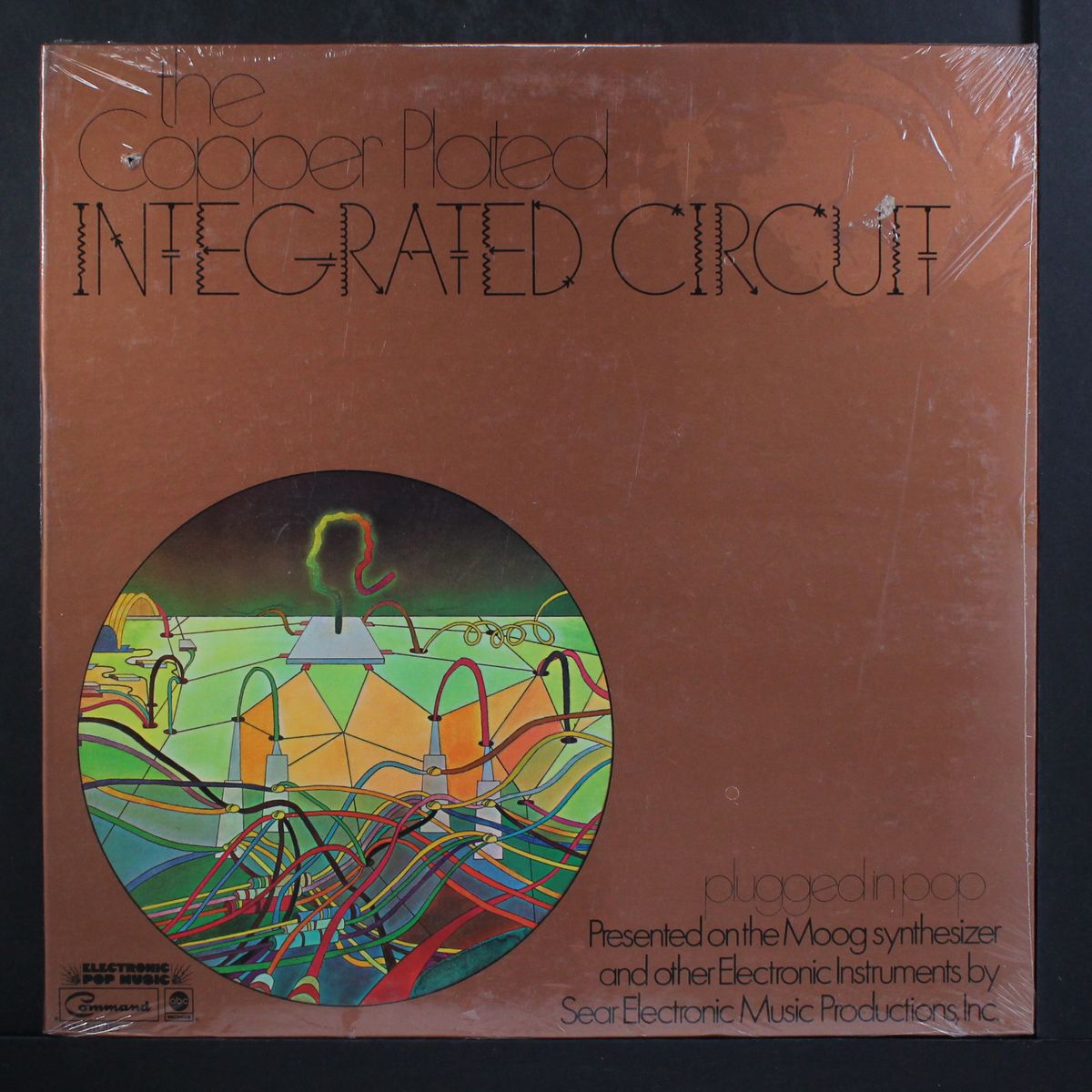 plugged in pop by COPPER PLATED INTEGRATED CIRCUIT