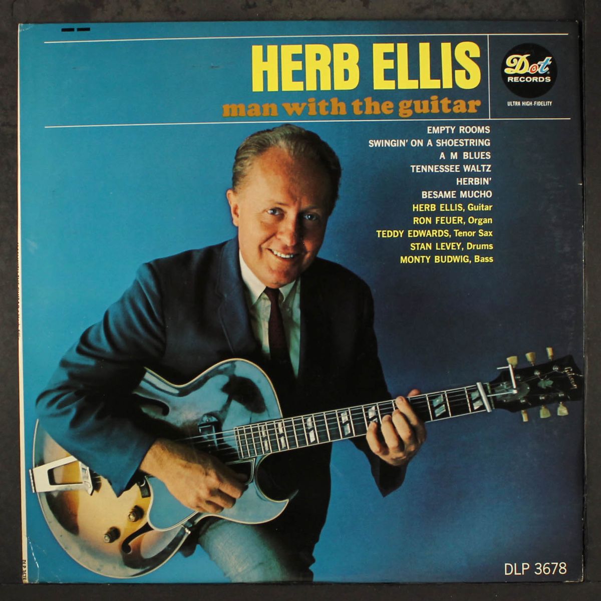 man with the guitar by HERB ELLIS