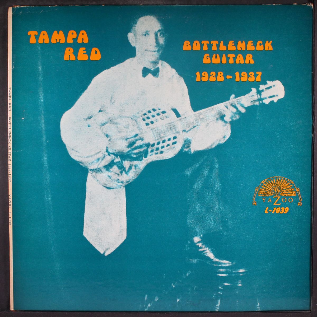 bottleneck guitar, 1928-1937 by TAMPA RED