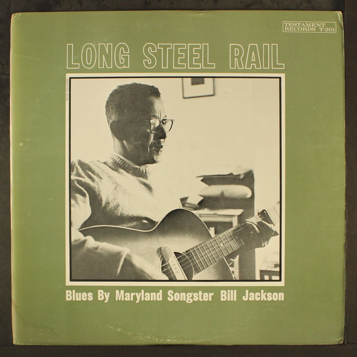 long steel rail by BILL JACKSON