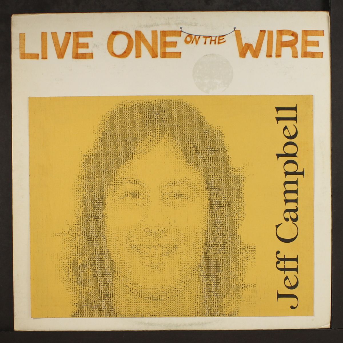 live one on the wire by JEFF CAMPBELL