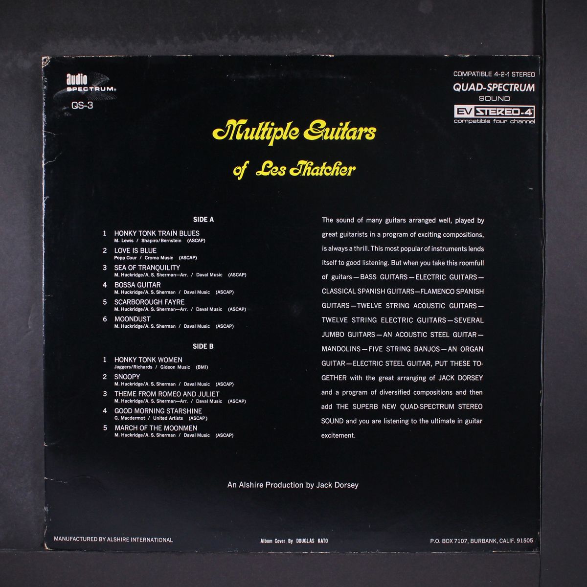 multiple guitars by LES THATCHER