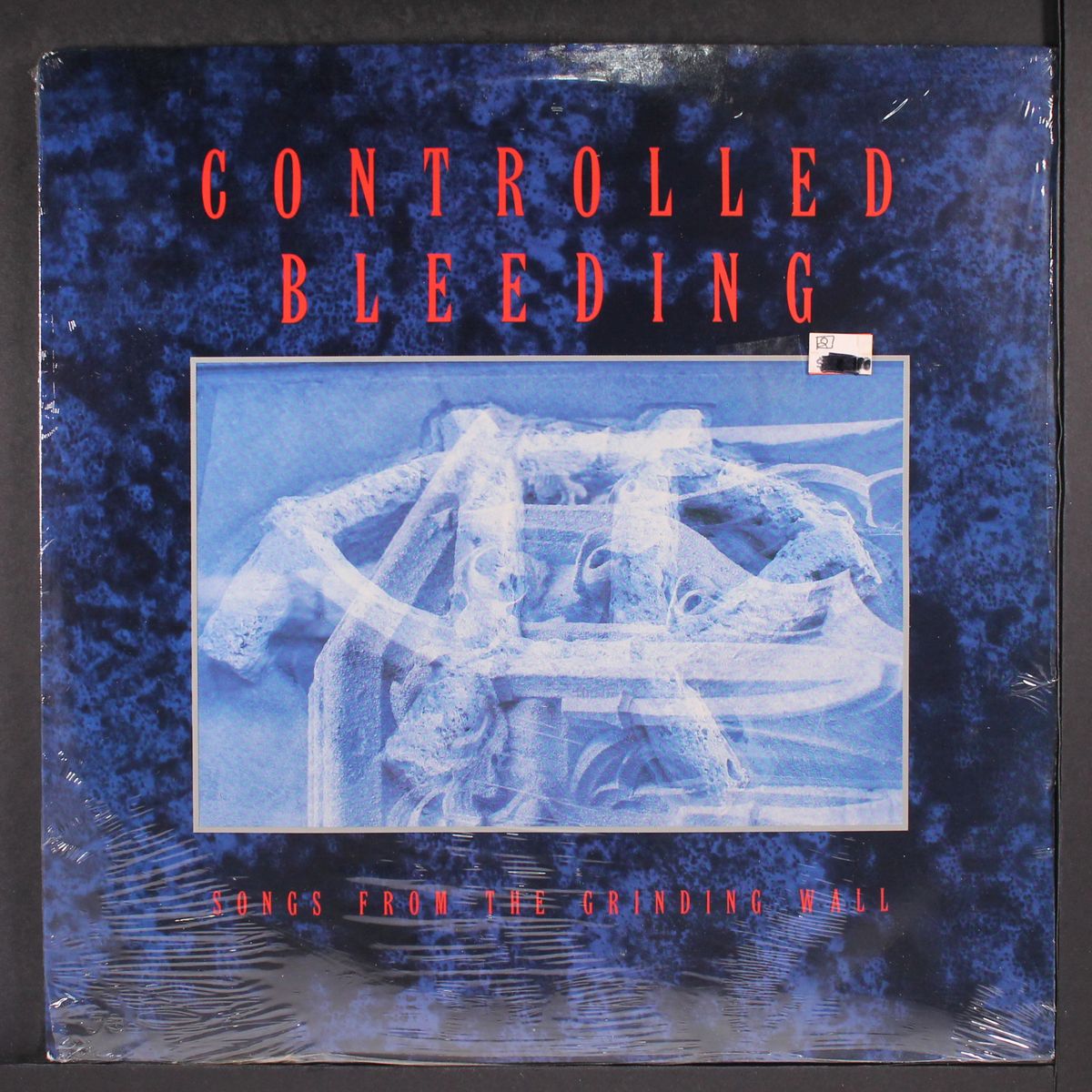 songs from the grinding wall by CONTROLLED BLEEDING