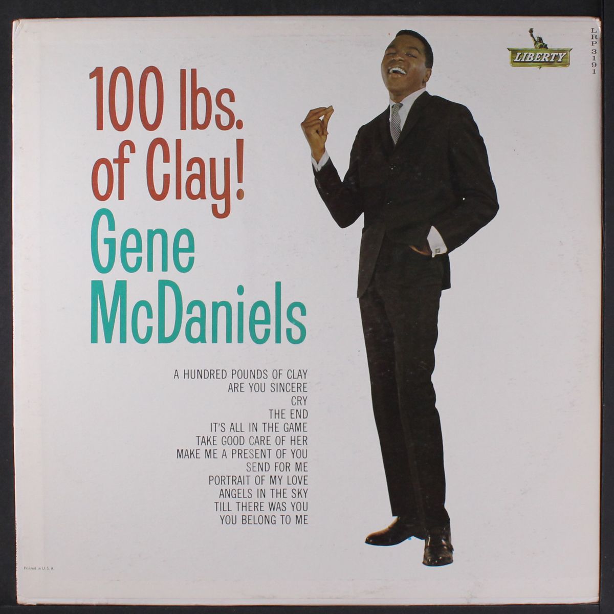 100 lbs. of clay! by GENE MCDANIELS
