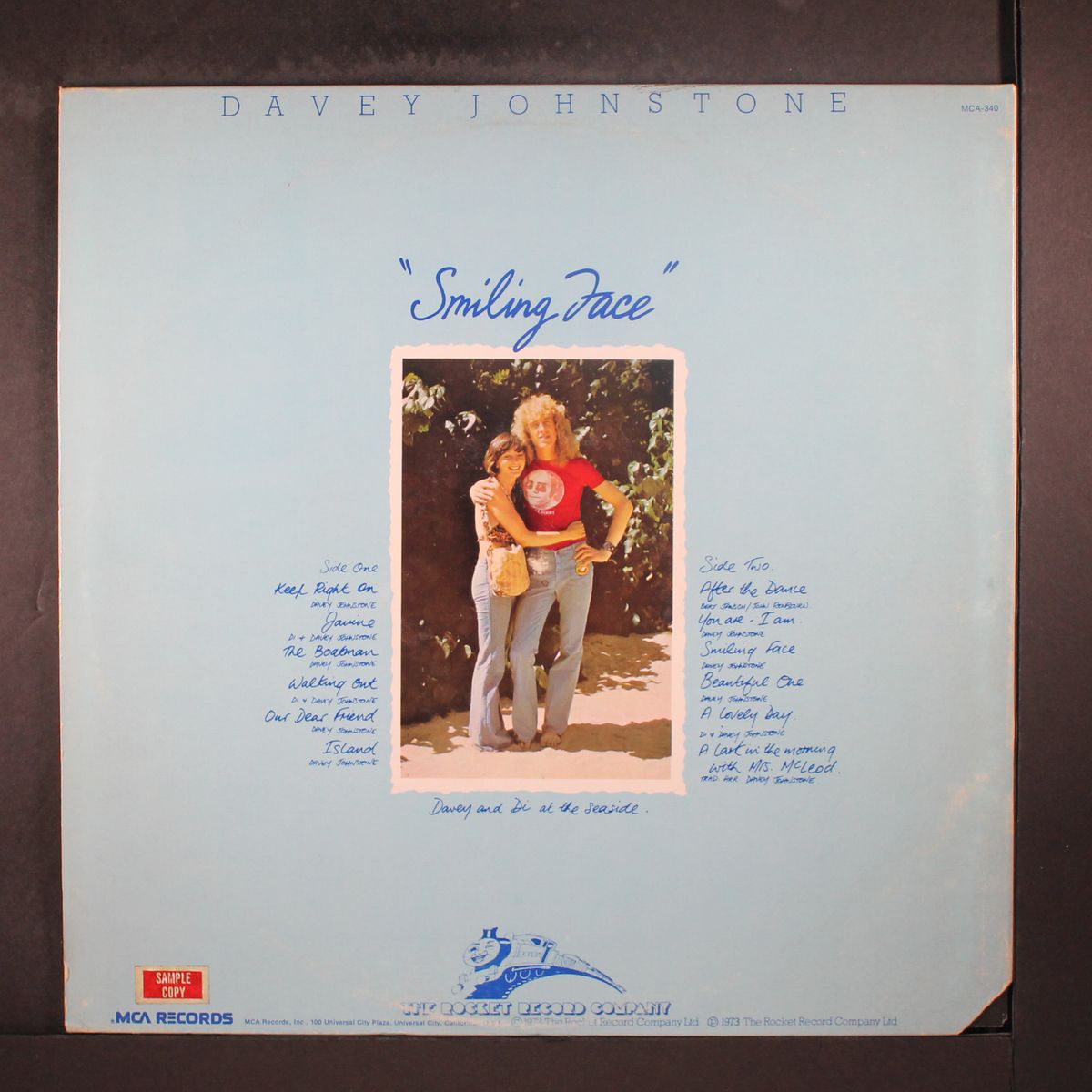 smiling face by DAVEY JOHNSTONE