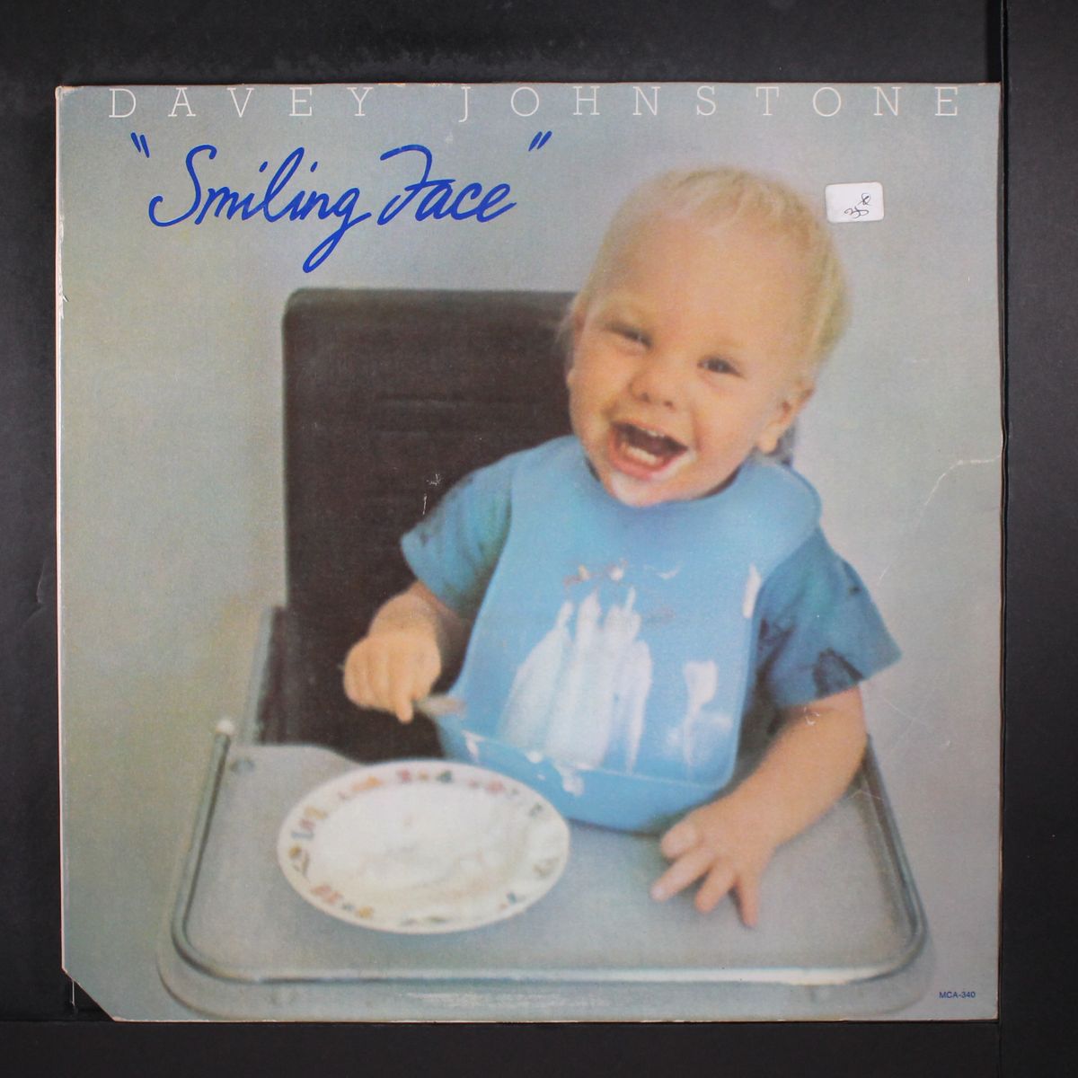 smiling face by DAVEY JOHNSTONE