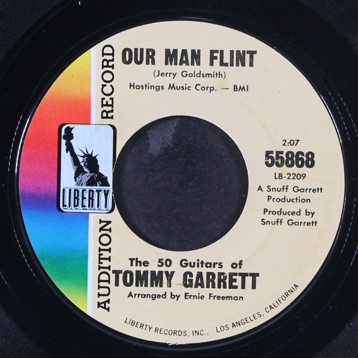 our man flint / tender moments by 50 GUITARS OF TOMMY GARRETT