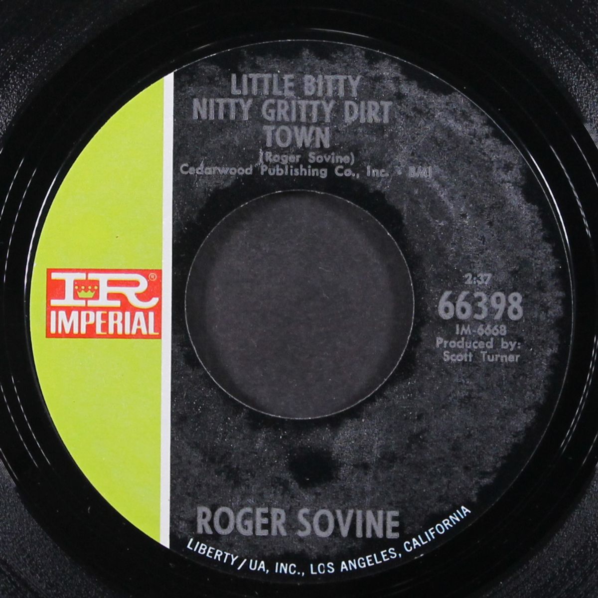 little bitty nitty gritty dirt town by ROGER SOVINE