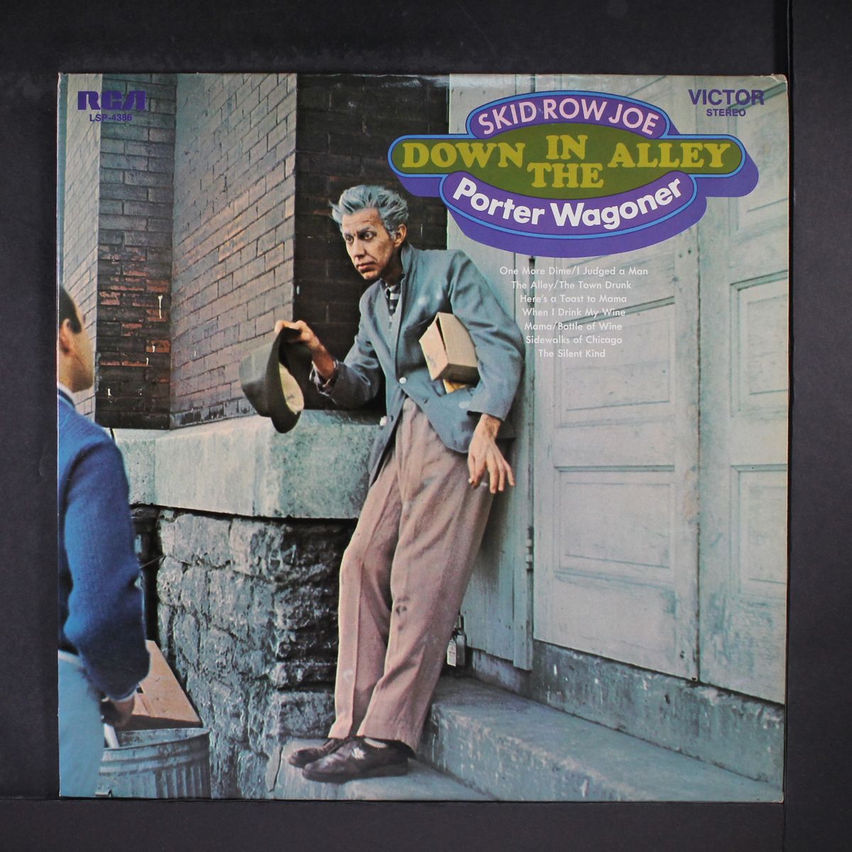skid row joe, down in the alley by PORTER WAGONER