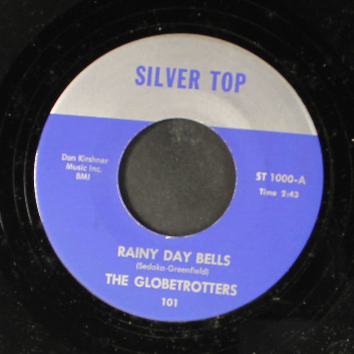 they say the girls crazy / rainy day bells by INVITATIONS / GLOBETROTTERS