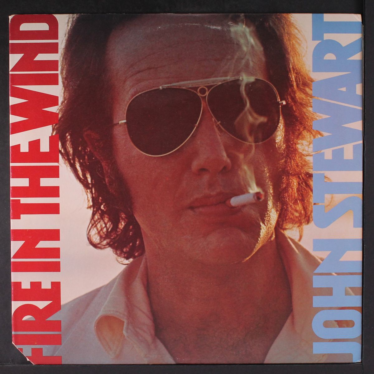 fire in the wind by JOHN STEWART