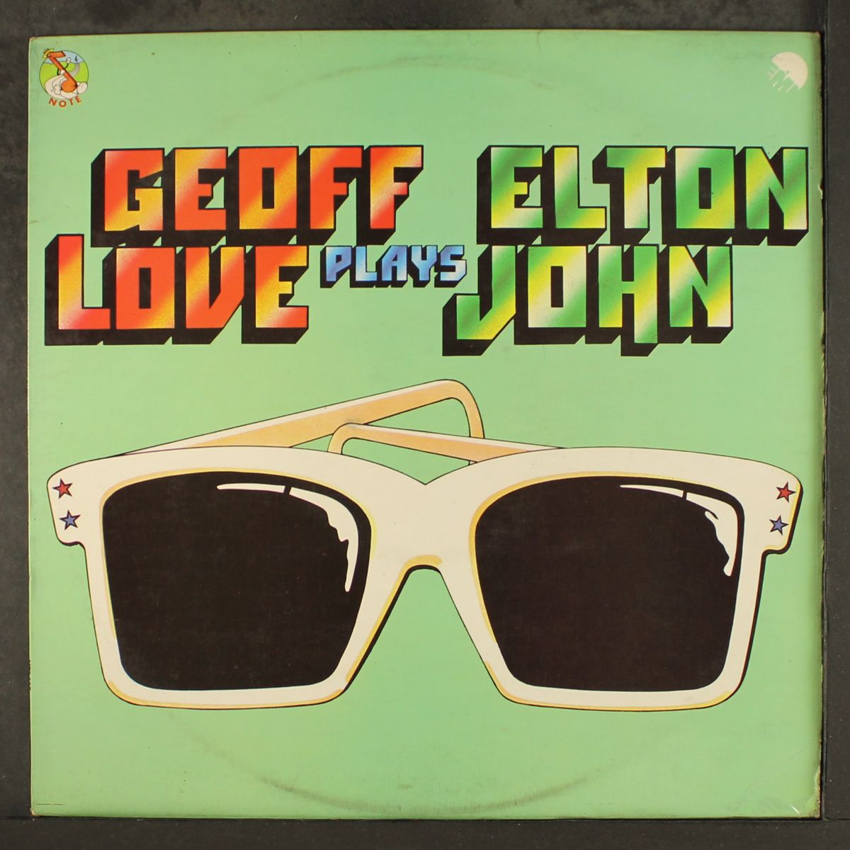 plays elton john by GEOFF LOVE