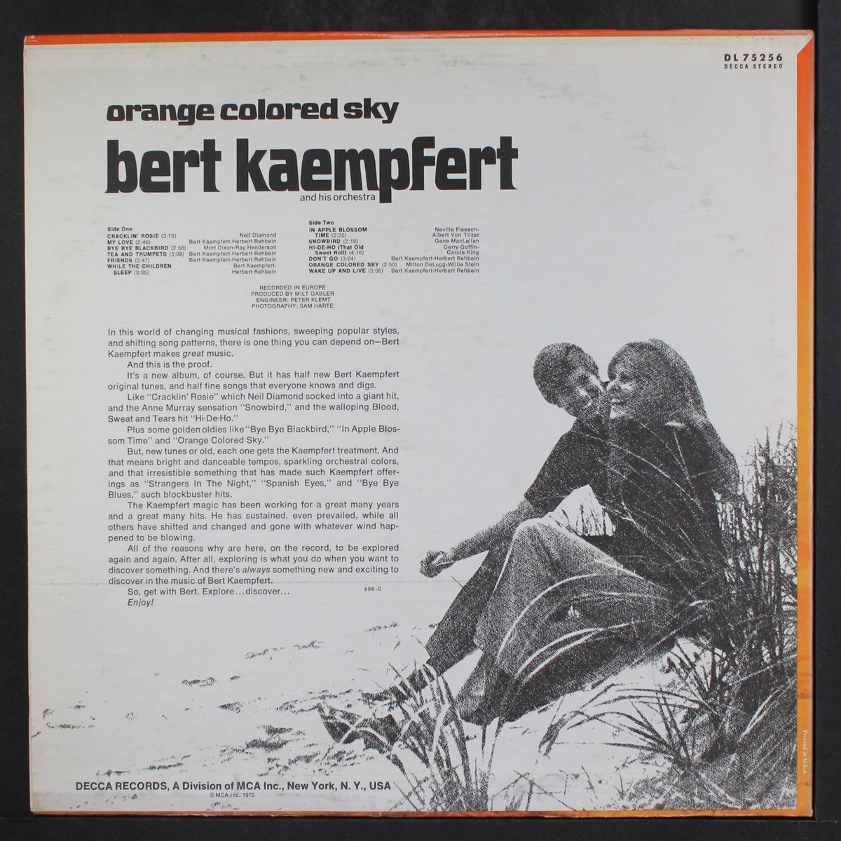 orange colored sky by BERT KAEMPFERT