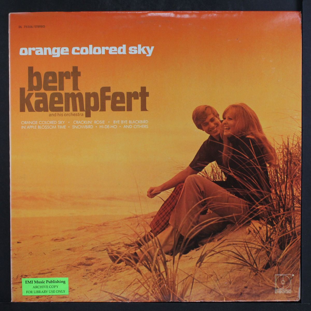 orange colored sky by BERT KAEMPFERT
