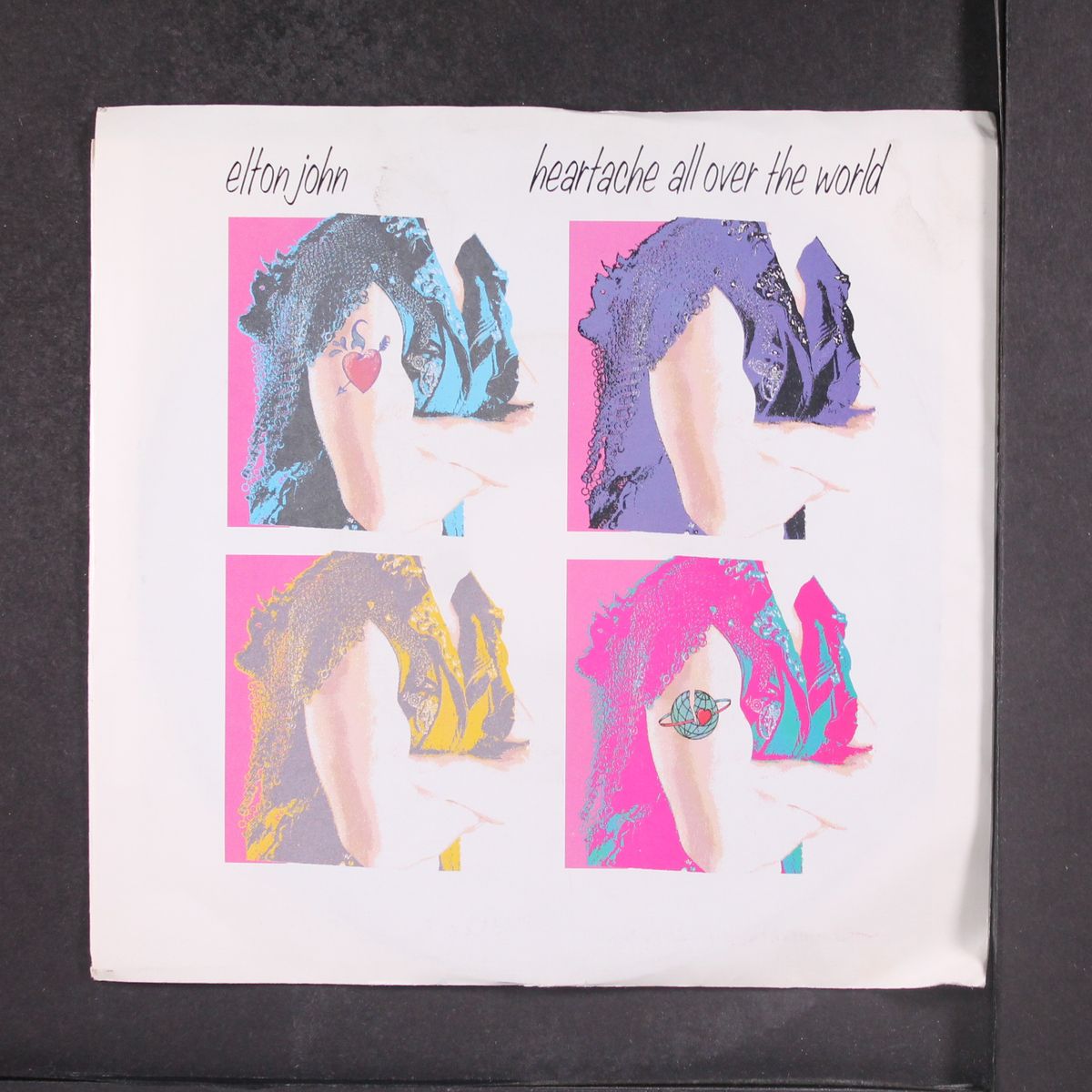 heartache all over the world by ELTON JOHN