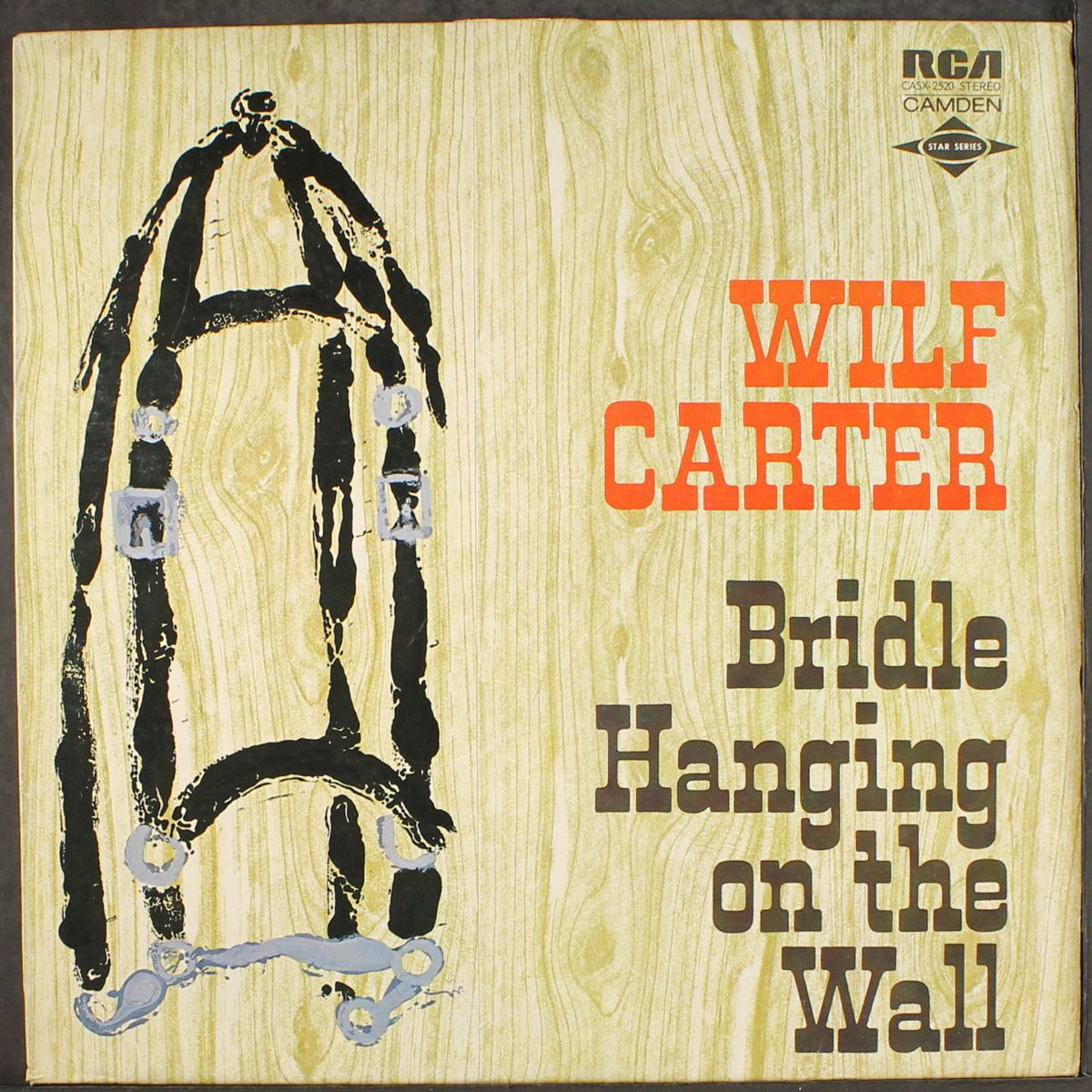 bridle hanging on the wall by WILF CARTER