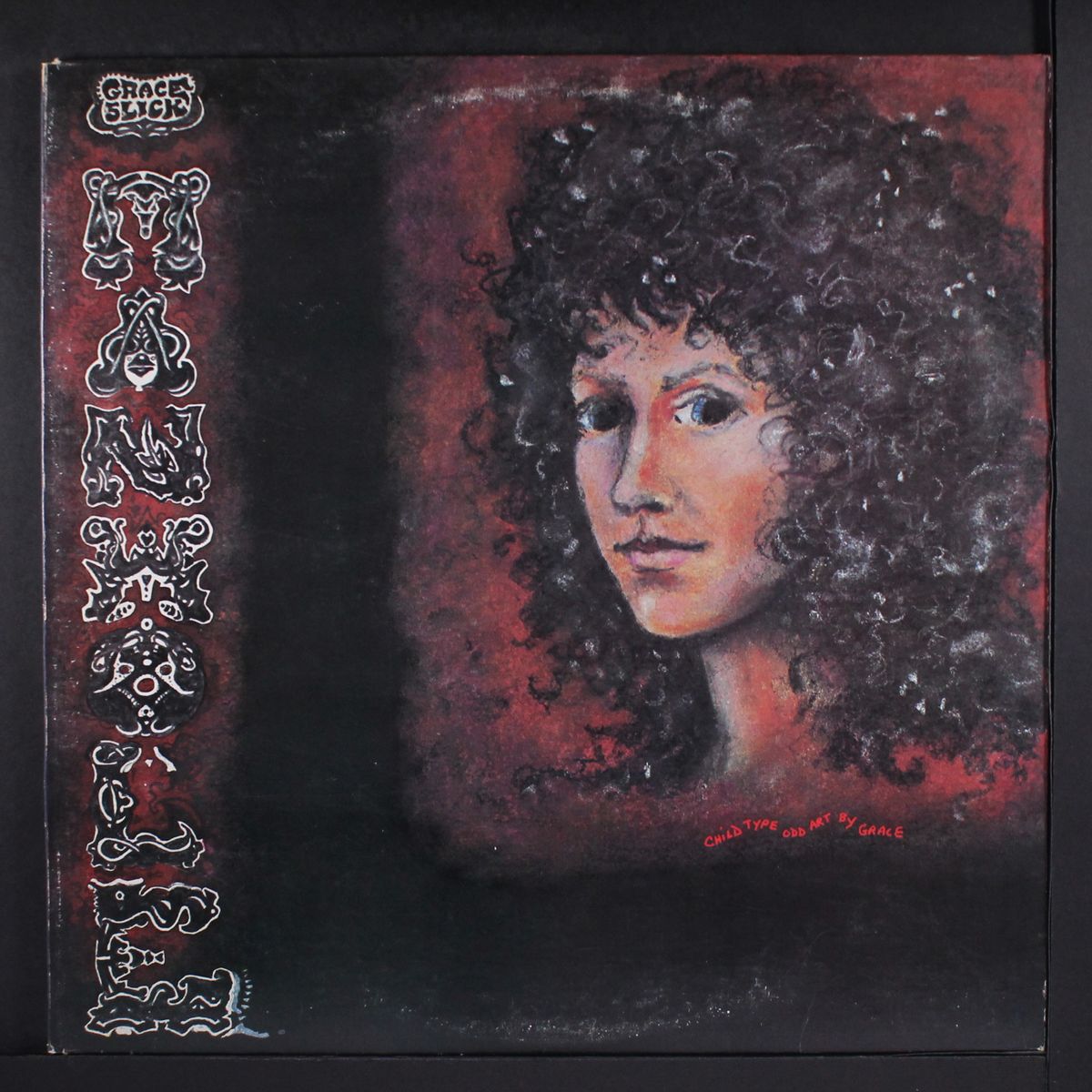 manhole by GRACE SLICK