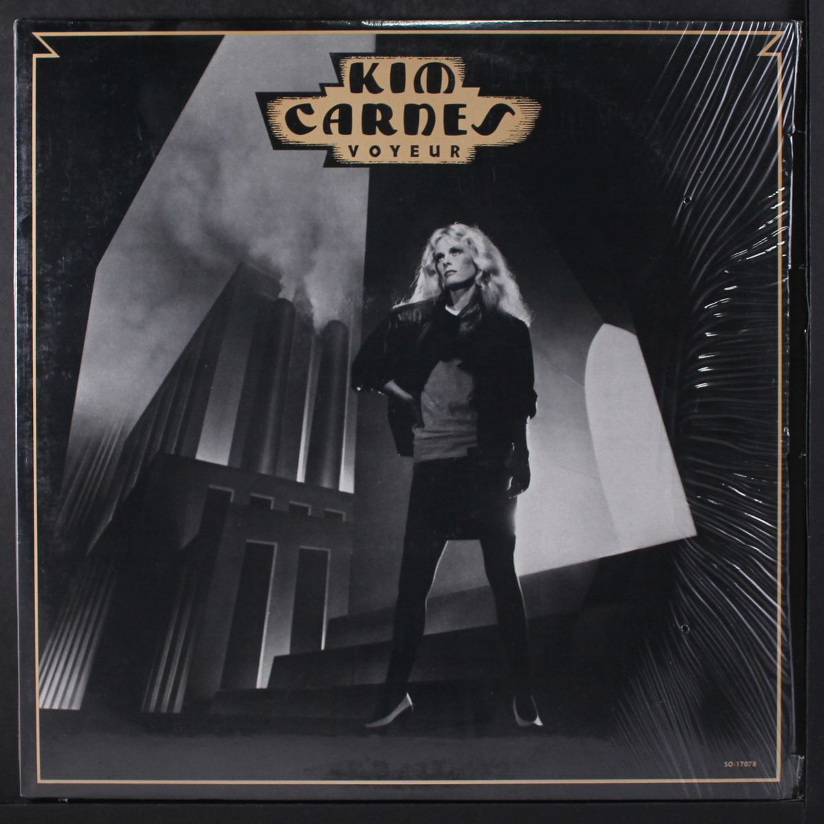 voyeur by KIM CARNES