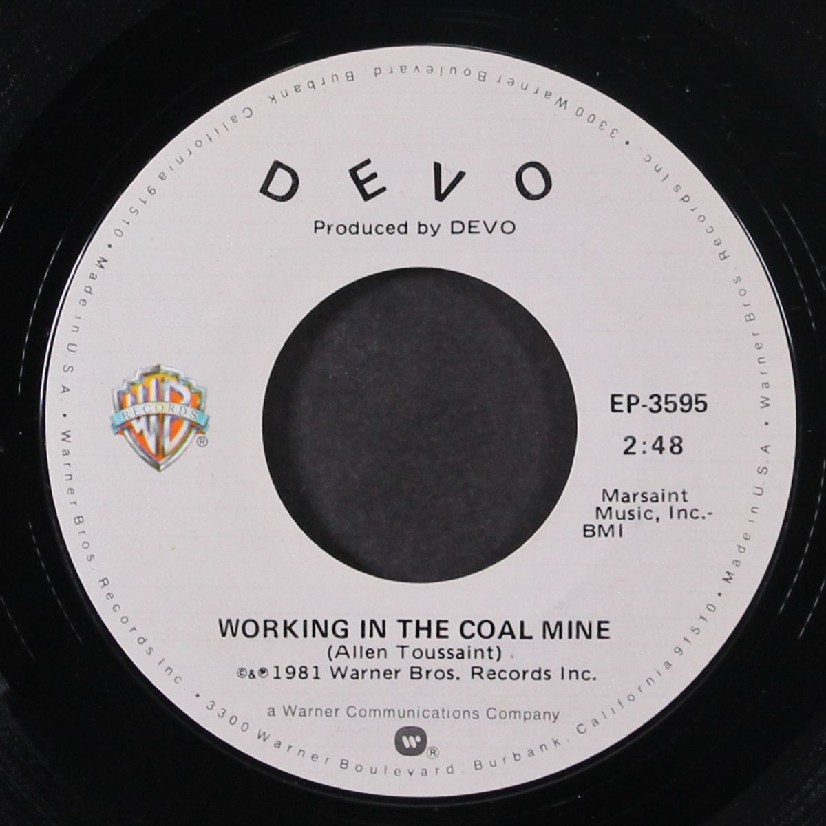 working in the coal mine / same by DEVO