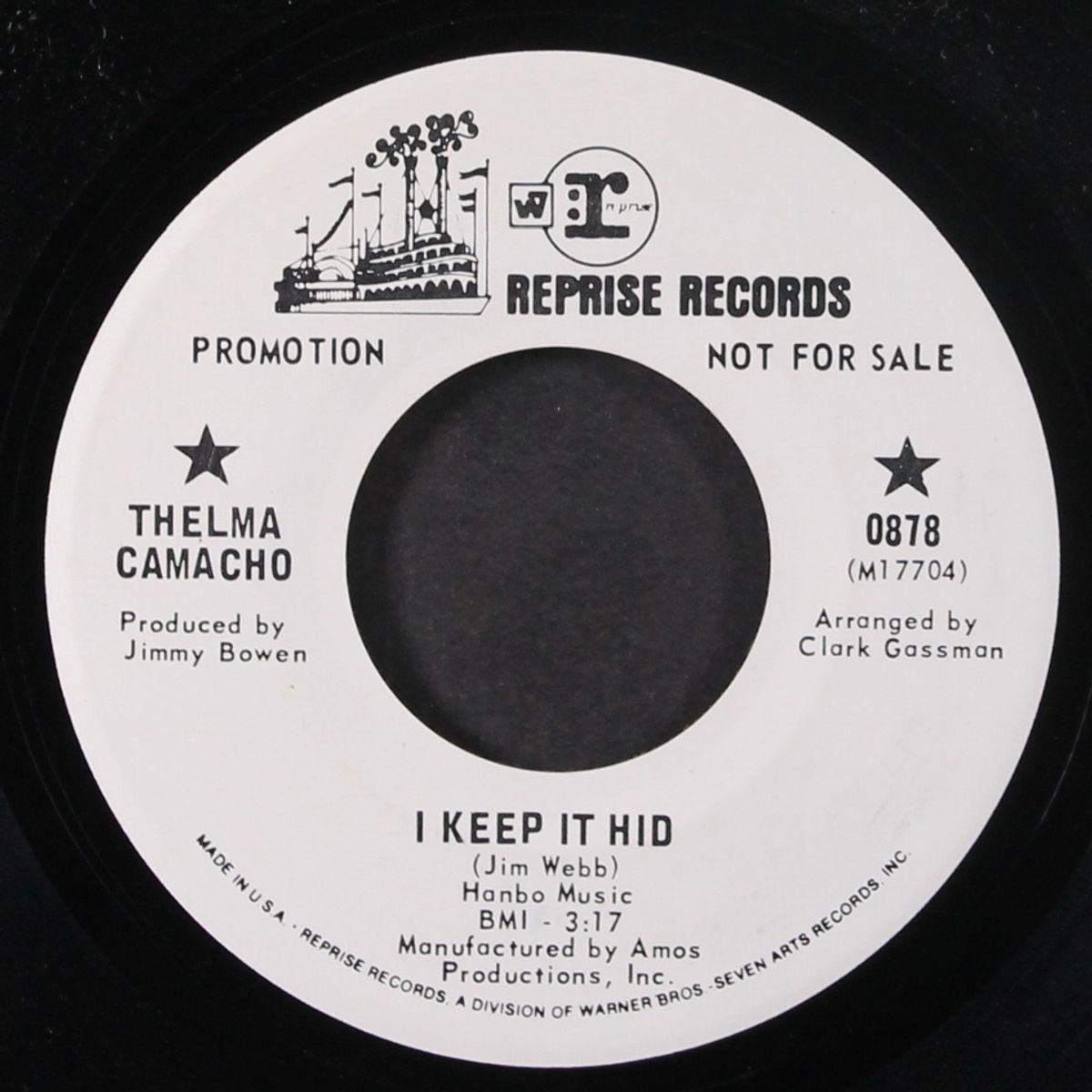 i keep it hid / time by THELMA CAMACHO