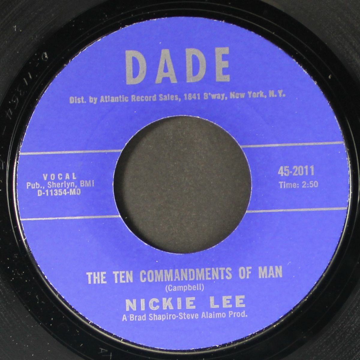 the ten commandments of man / late shadows by NICKIE LEE
