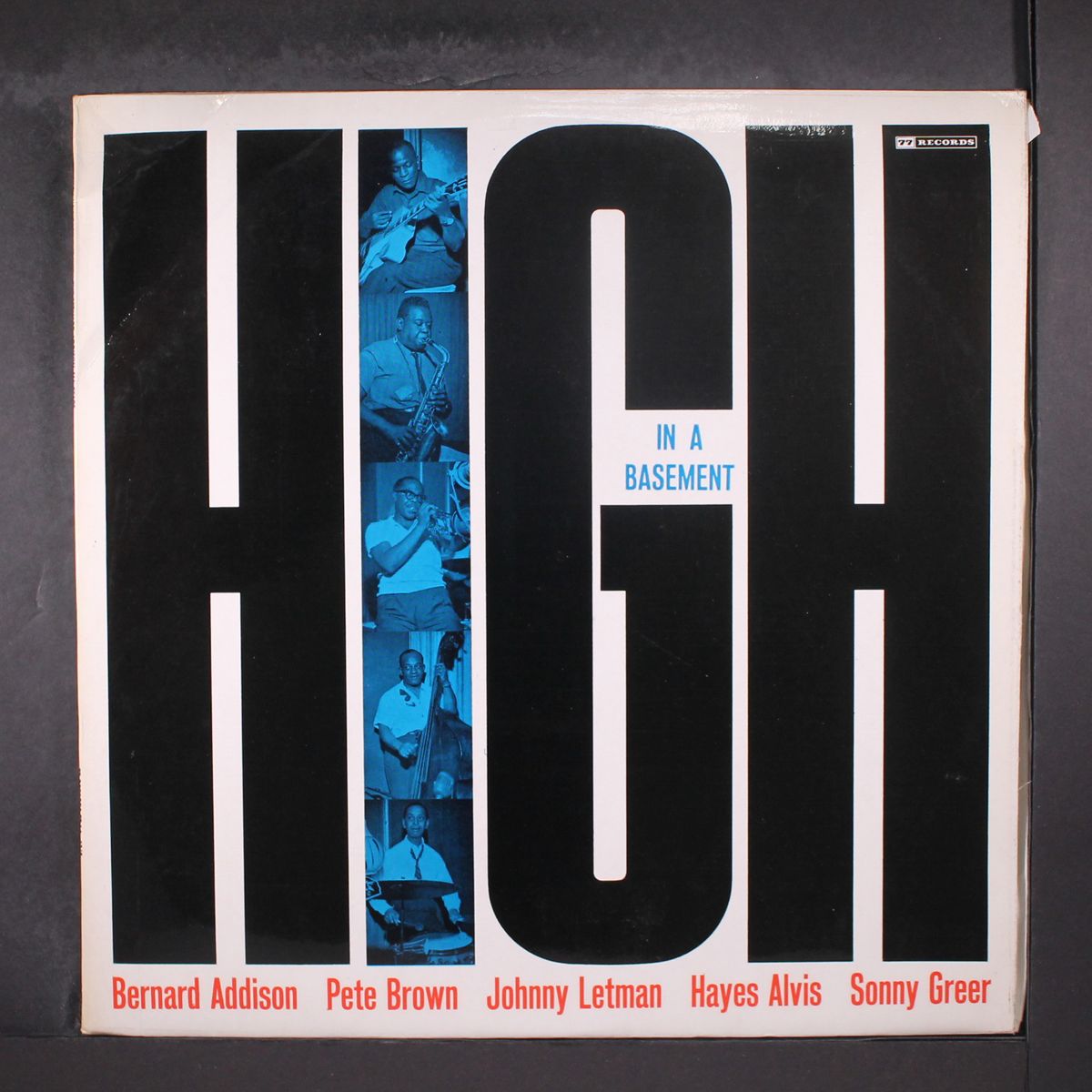 high in a basement by BERNARD ADDISON