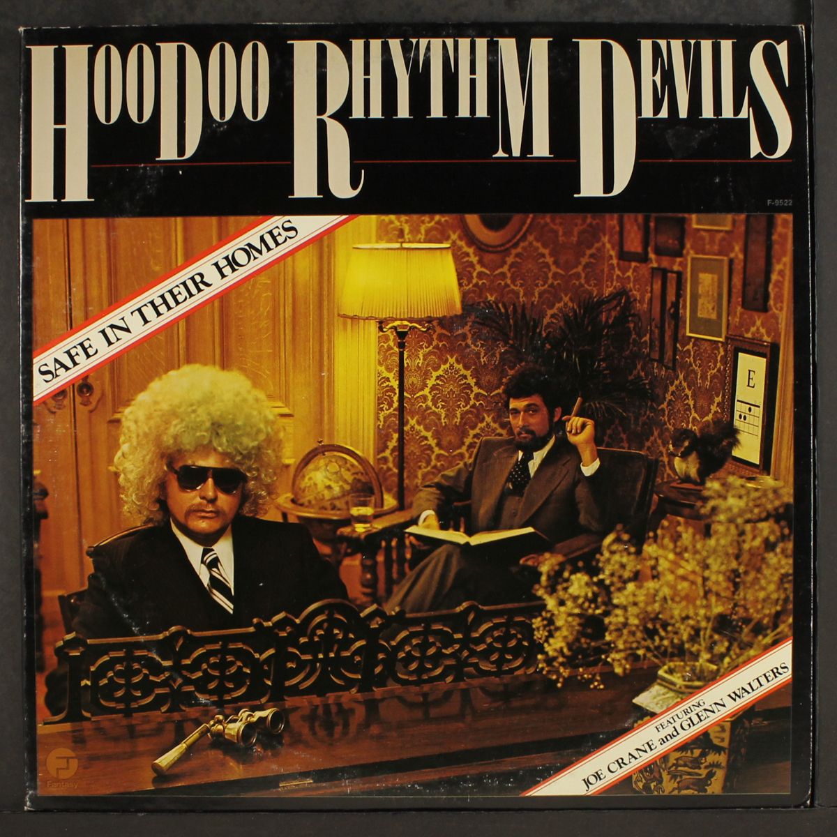 safe in their homes by HOODOO RHYTHM DEVILS
