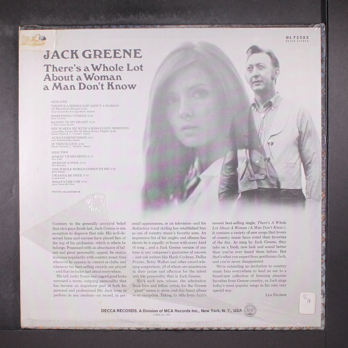 there's a whole lot about a woman... by JACK GREENE