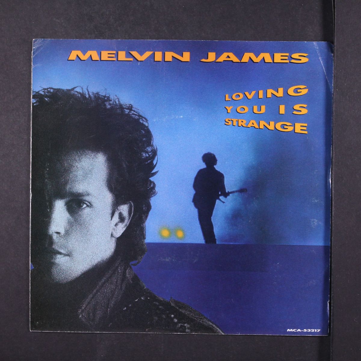 loving you is strange / same by MELVIN JAMES