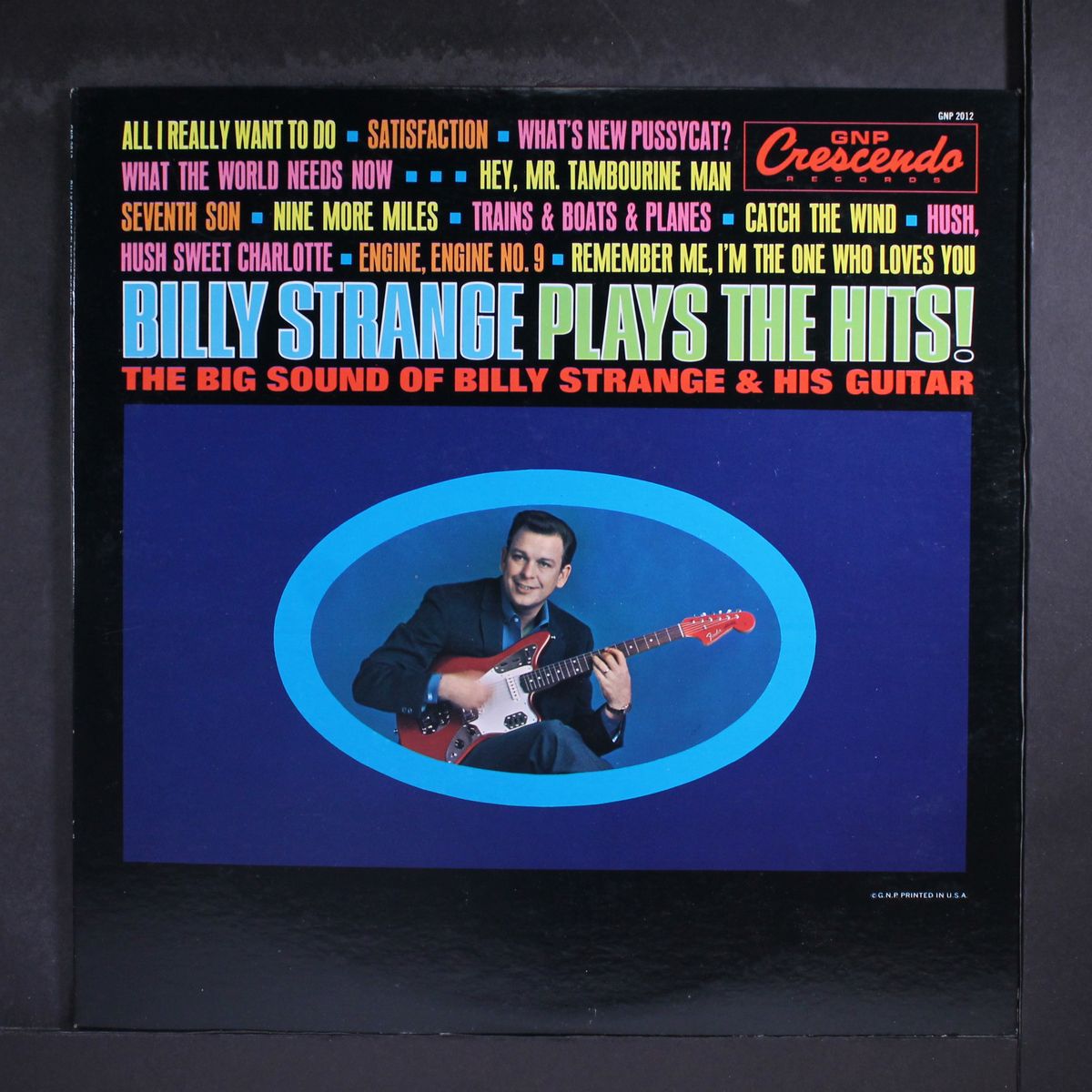 plays the hits by BILLY STRANGE