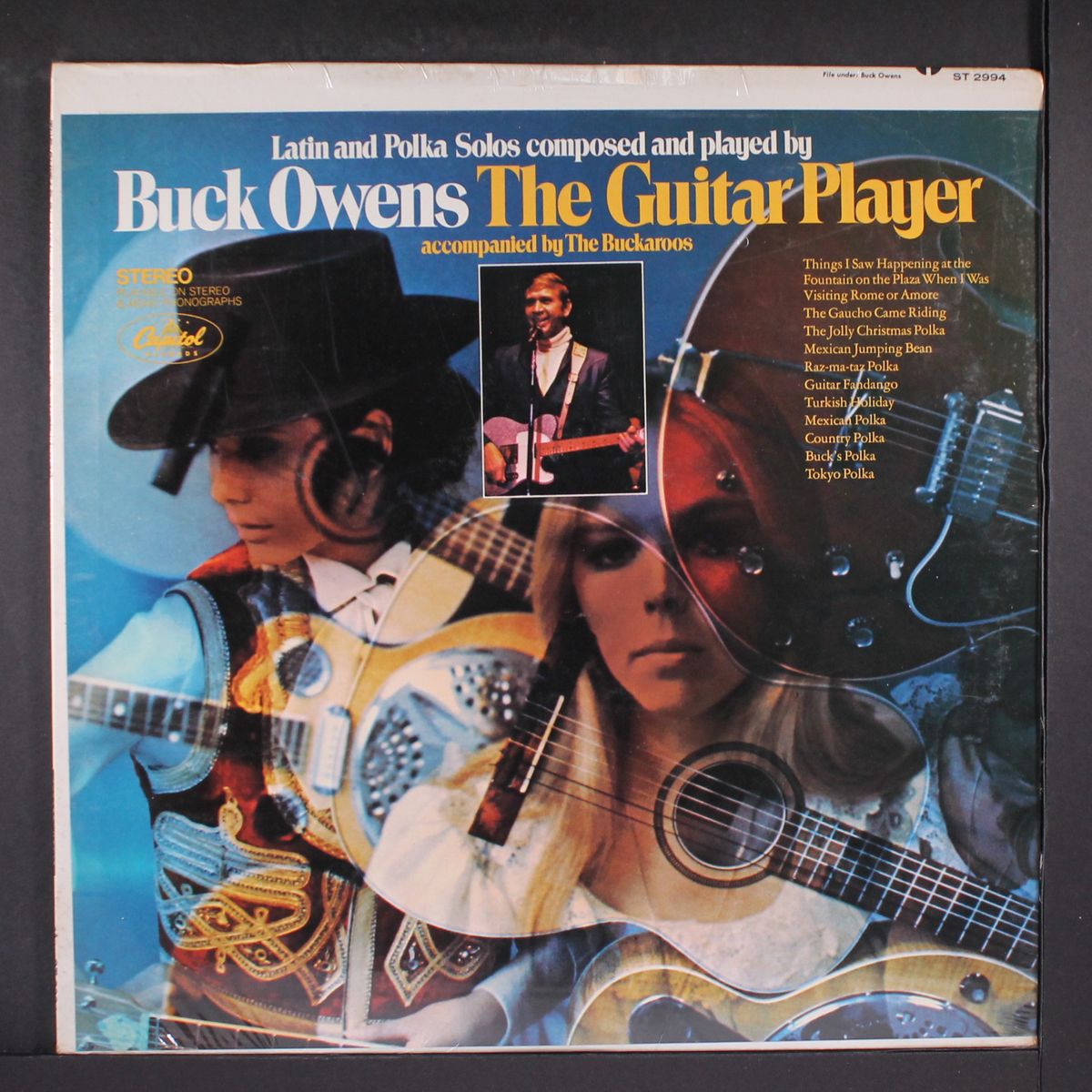 the guitar player by BUCK OWENS