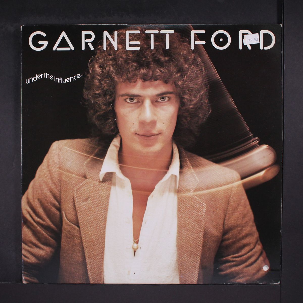 under the influence... by GARNETT FORD