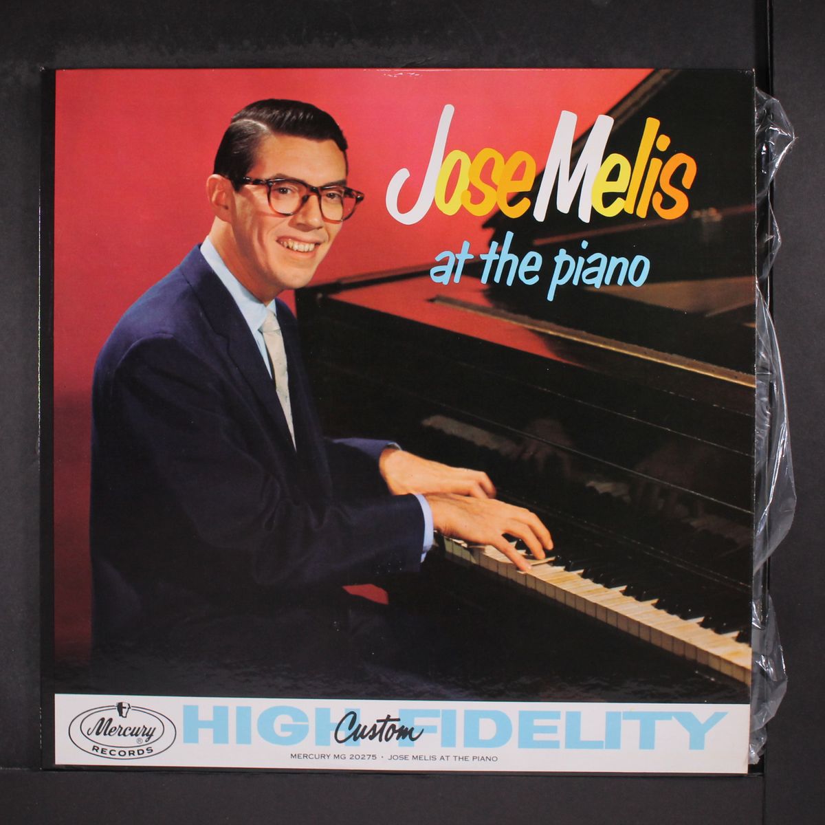 at the piano by JOSE MELIS