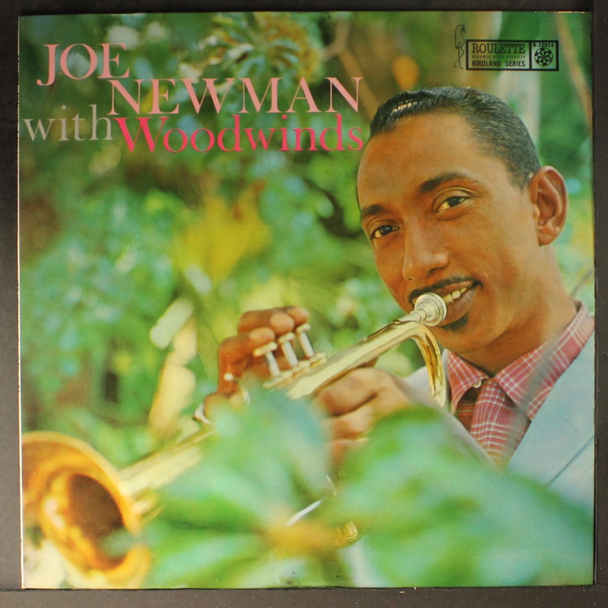 with woodwinds by JOE NEWMAN