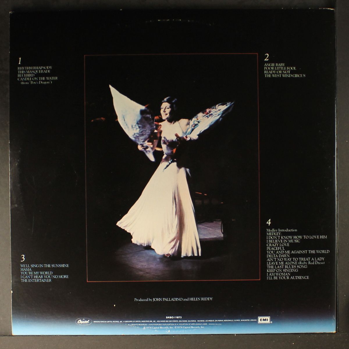 live in london by HELEN REDDY