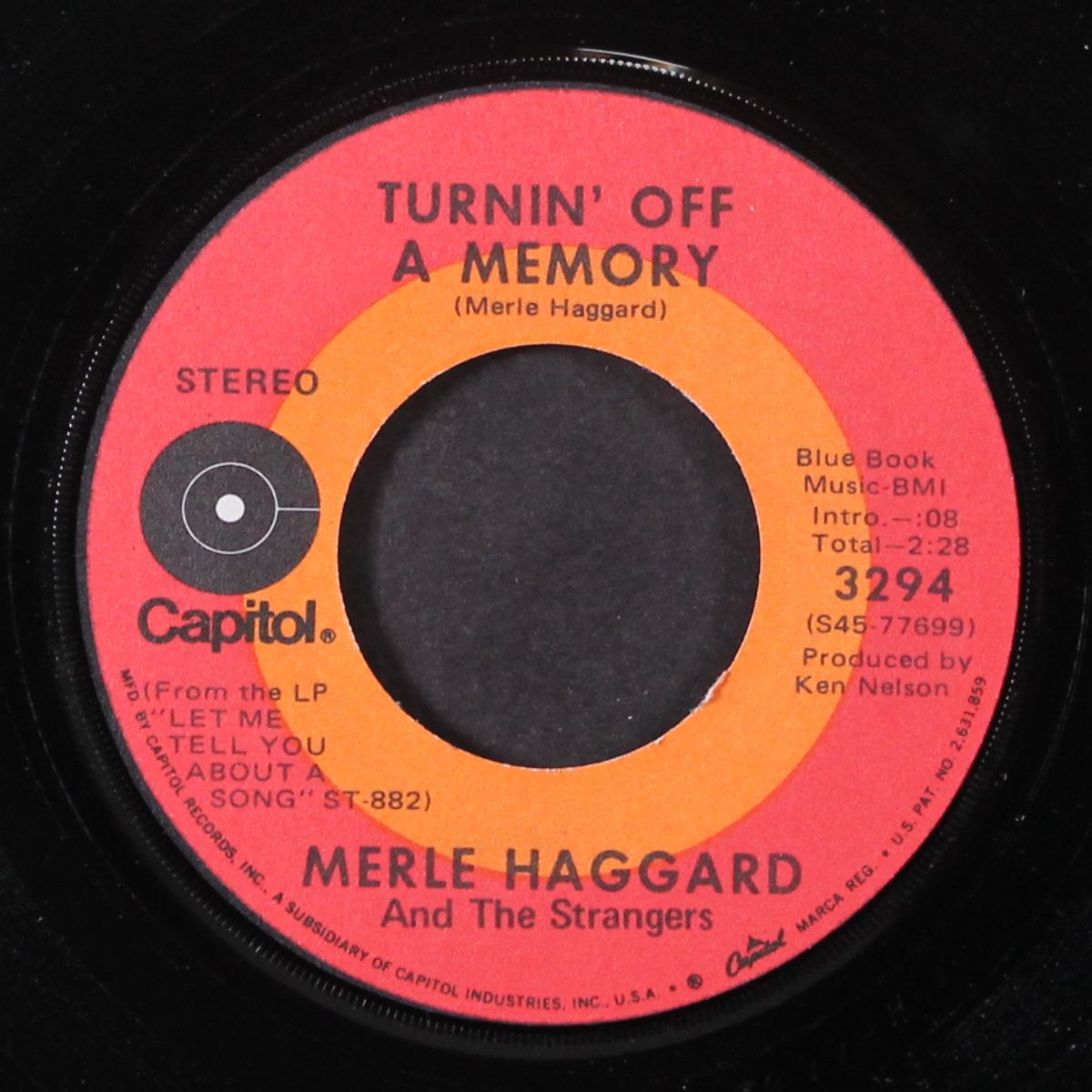 turnin' off a memory / grandma harp by MERLE HAGGARD