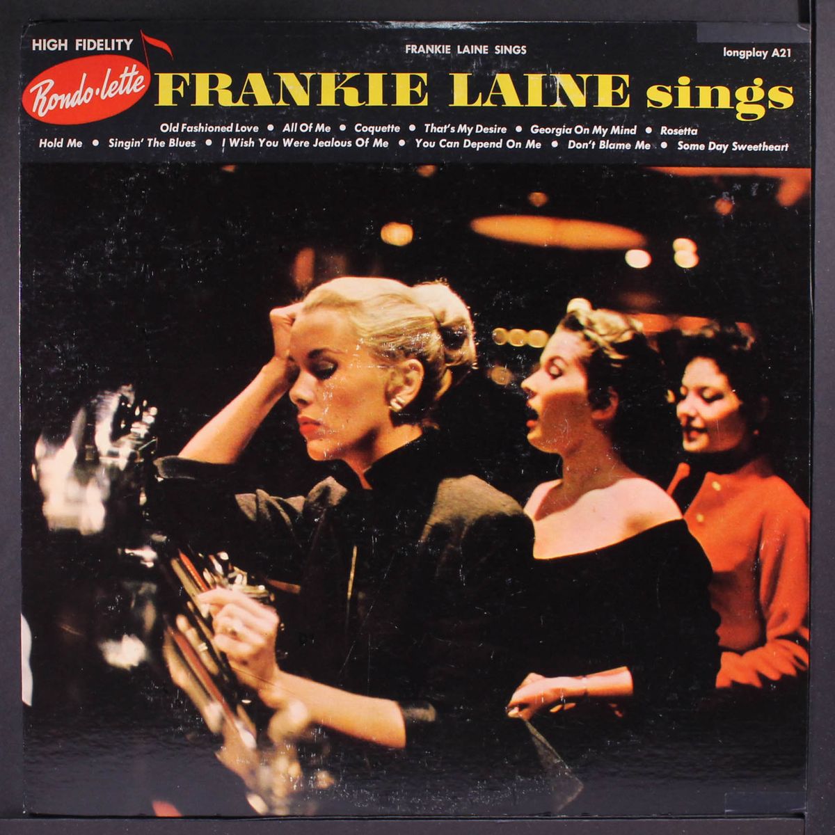 sings by FRANKIE LAINE