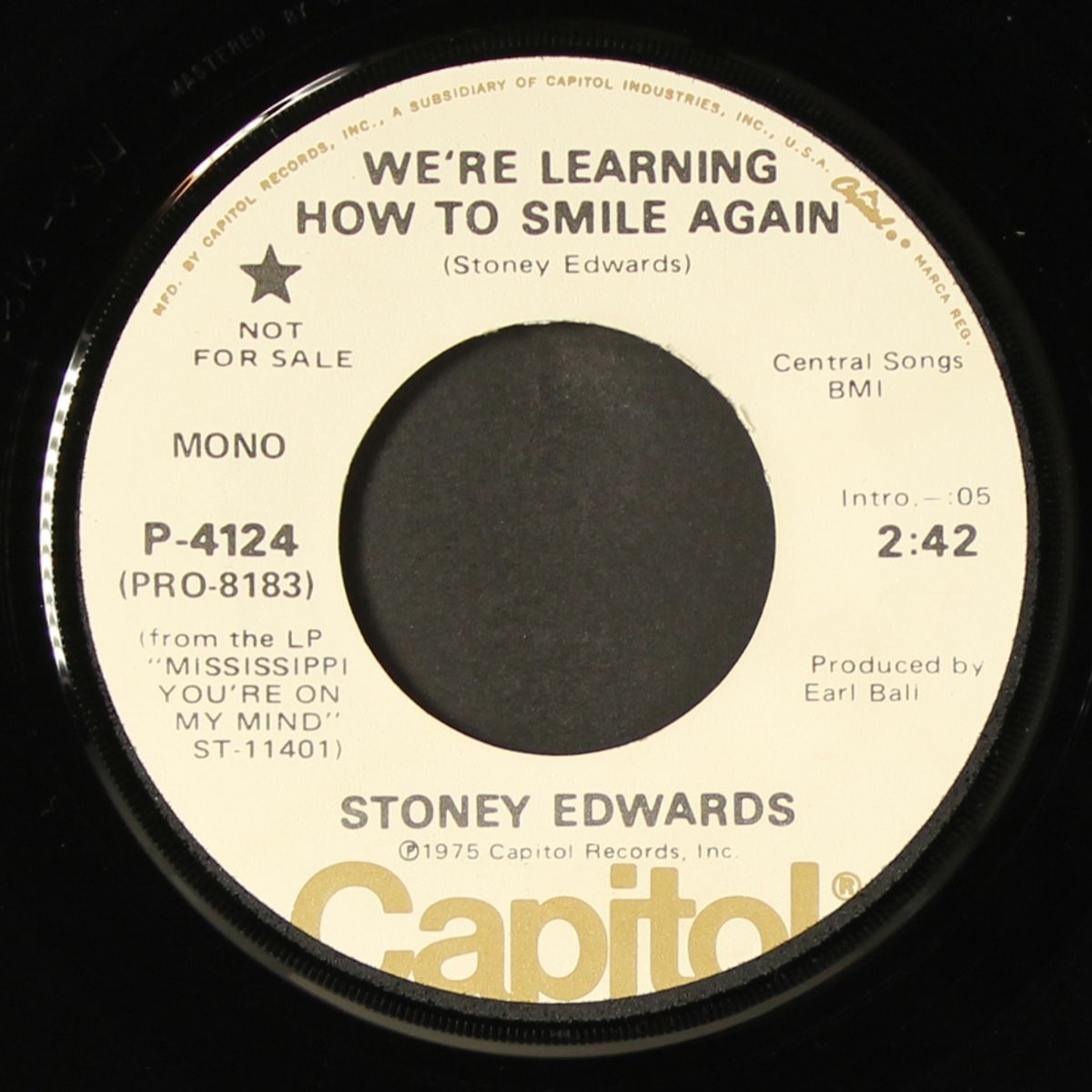 we're learning how to smile again by STONEY EDWARDS