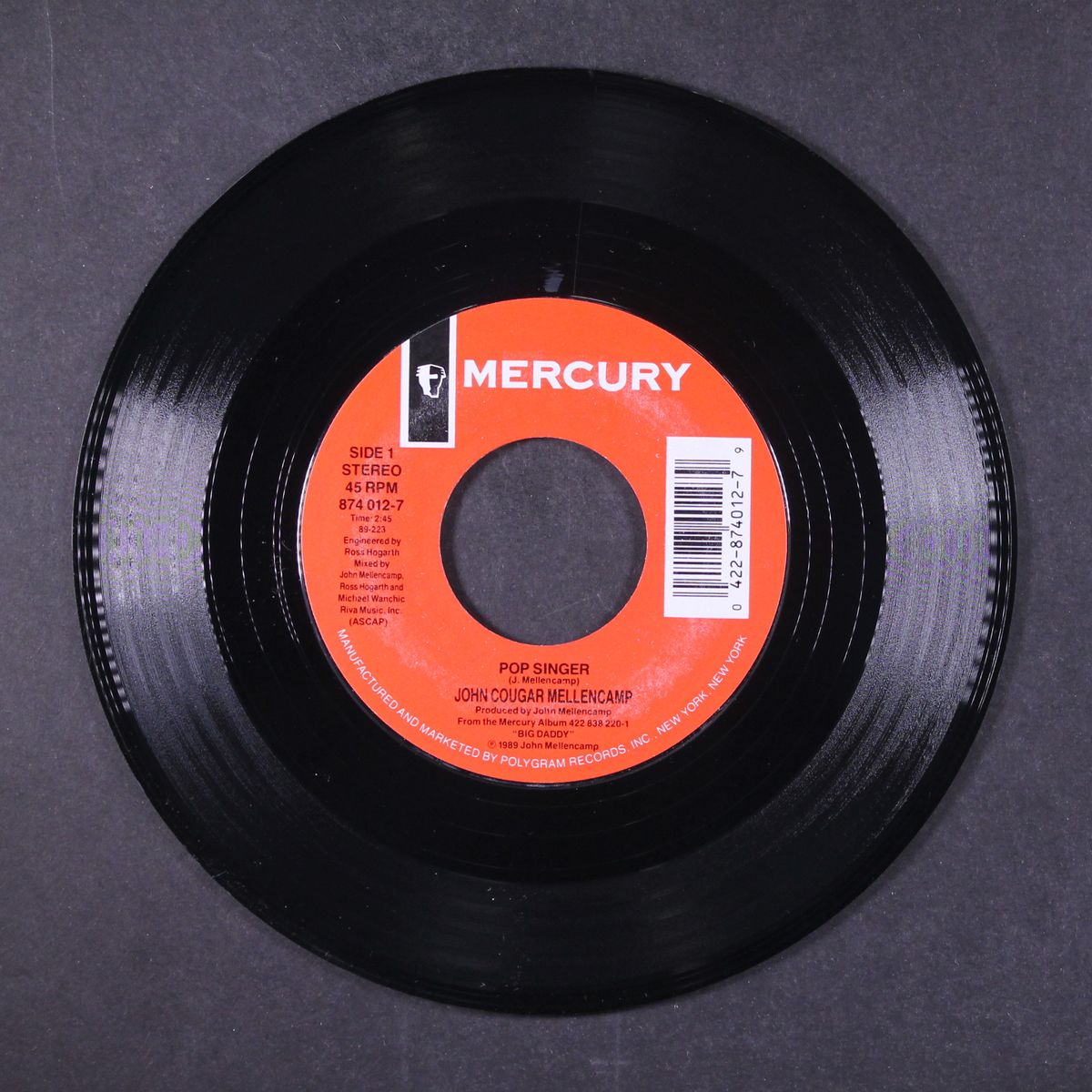 pop singer by JOHN COUGAR MELLENCAMP