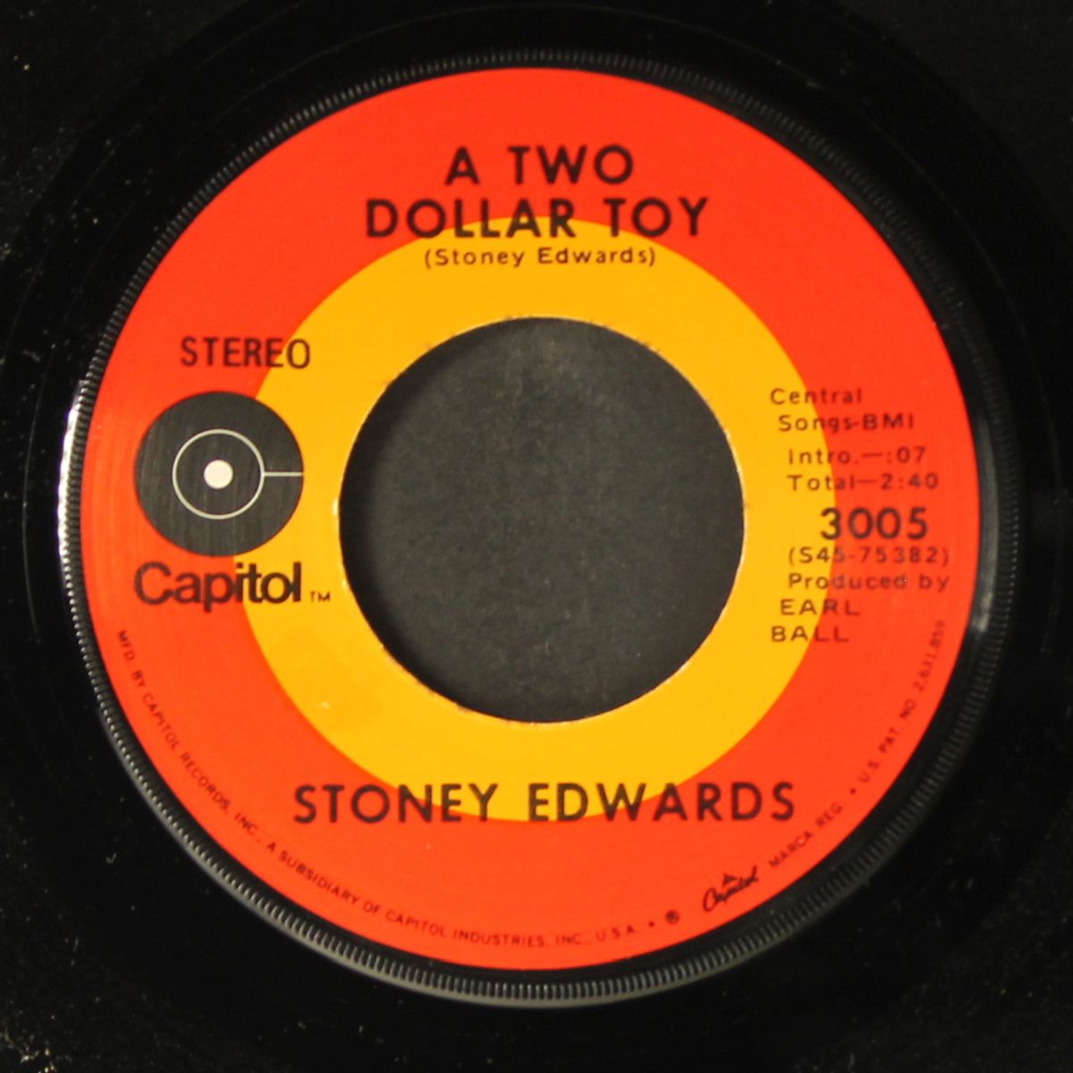 an old mule's hip / a two dollar toy by STONEY EDWARDS