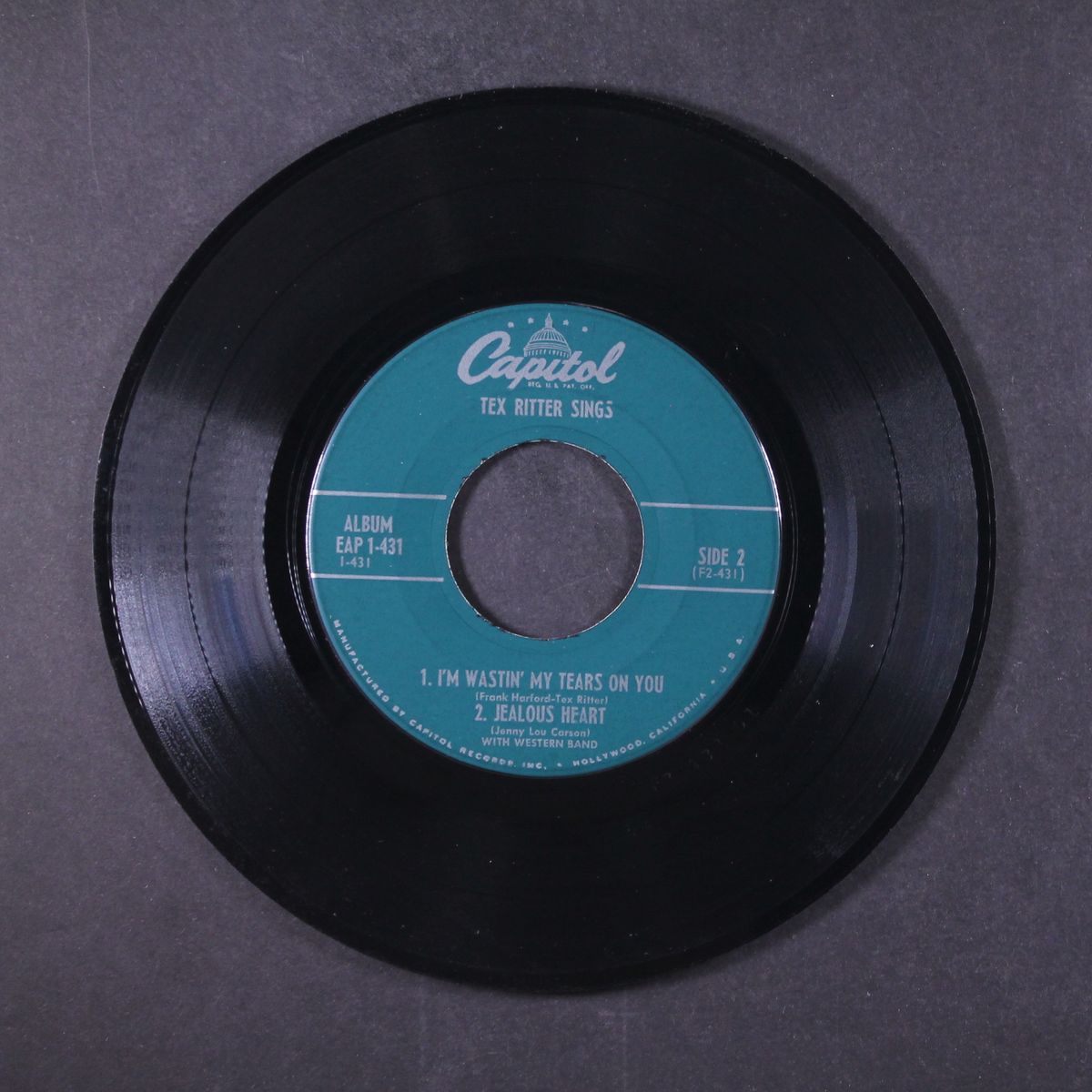 sings by TEX RITTER
