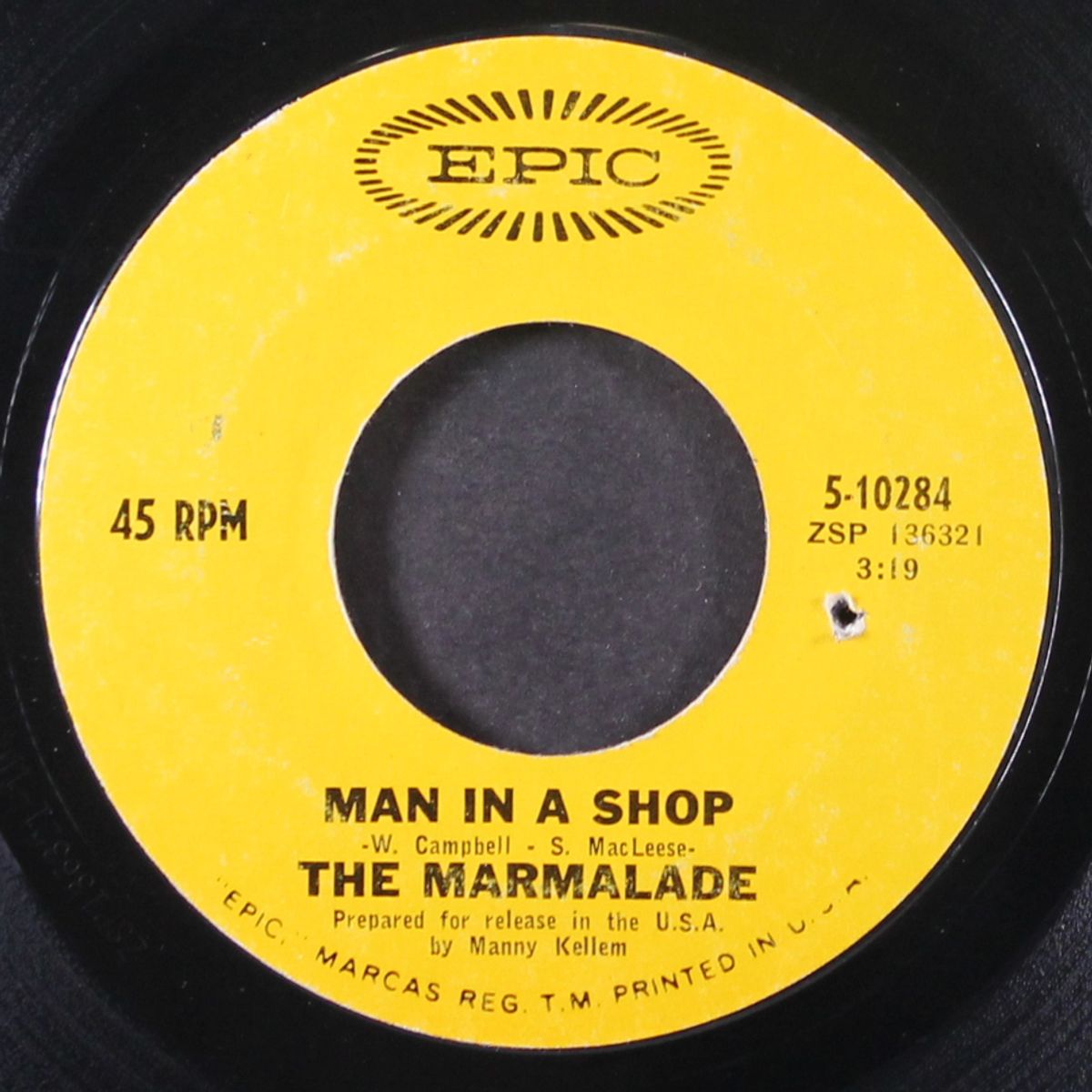 man in a shop by MARMALADE