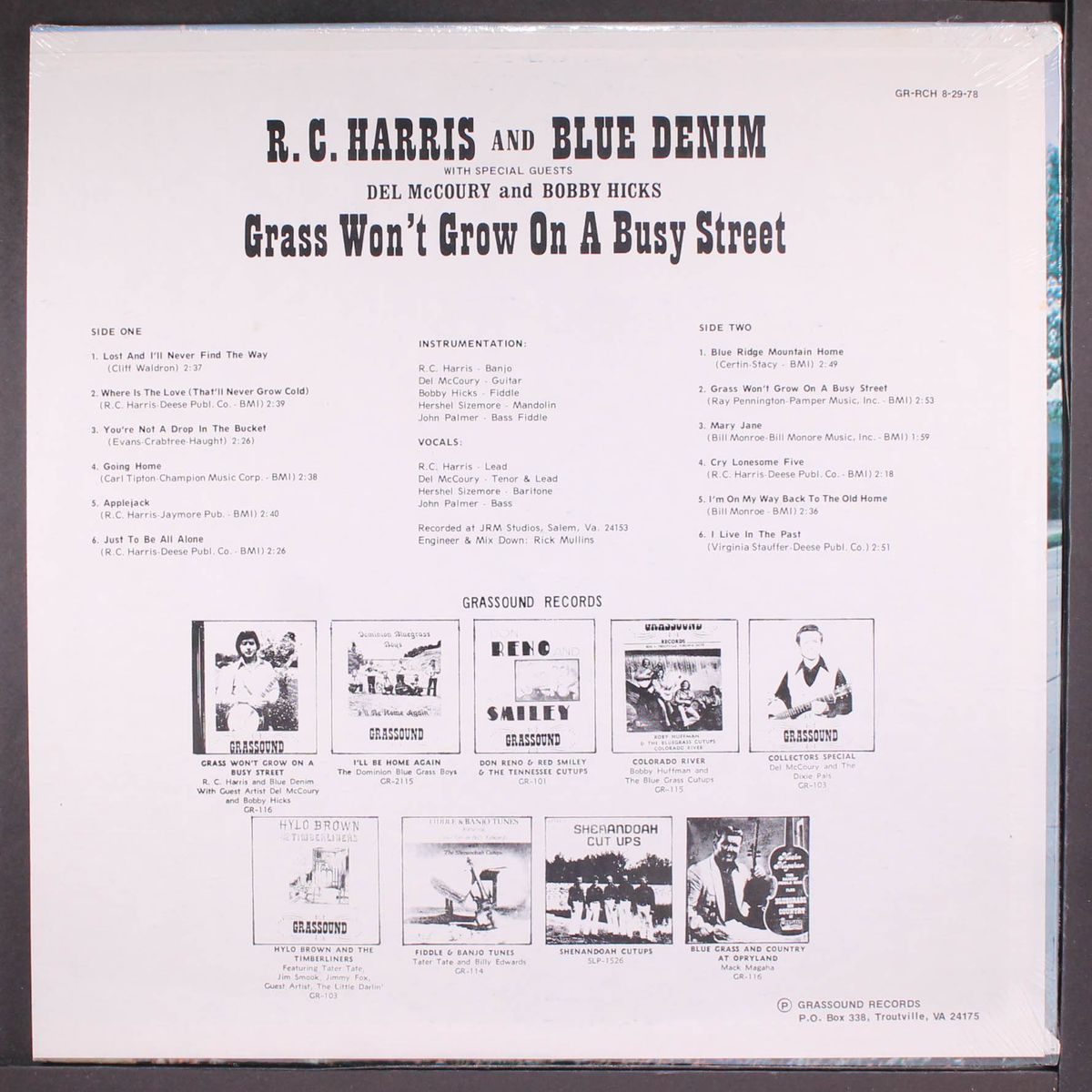 grass won't grow on a busy street by R.C. HARRIS & BLUE DENIM