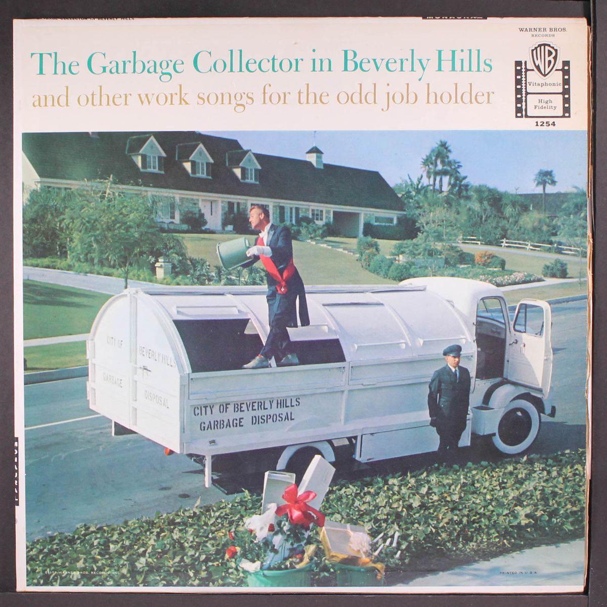 the garbage collector in beverly hills by IRVING TAYLOR