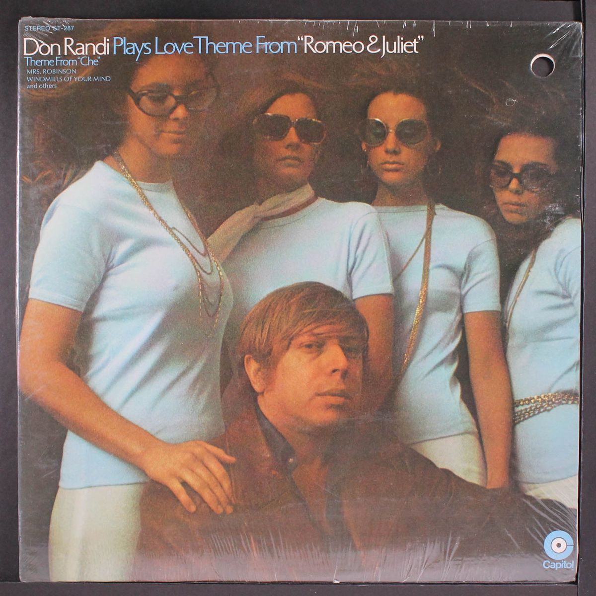 plays love theme from romeo & juliet by DON RANDI