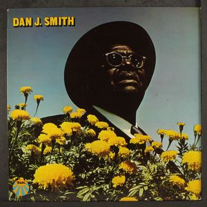 DAN J. SMITH