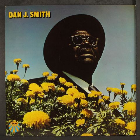 DAN J. SMITH